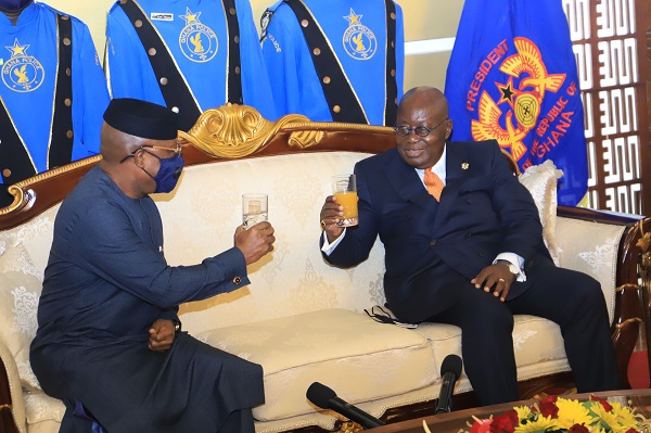 President Nana Addo Dankwa Akufo-Addo proposing a toast to Mr Ibok-Ete Ekwe Ibas, Nigerian Ambassador to Ghana at the Jubilee House.